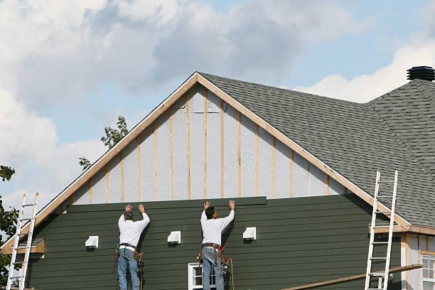 Professional Emergency Siding Repair technician working in Fletcher, NC